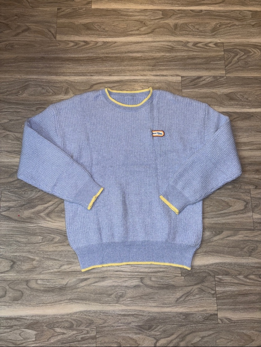 Vintage-Inspired Light Blue Men’s Sweater with Yellow Trim